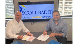 Photo of Jonathan Stowell, Group Commercial Director Scott Bader, shaking hands with Satyen representative.