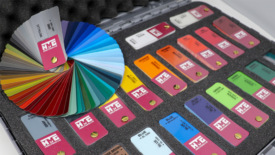 HMG涂料公司的色彩盒与新的金属颜色的照片